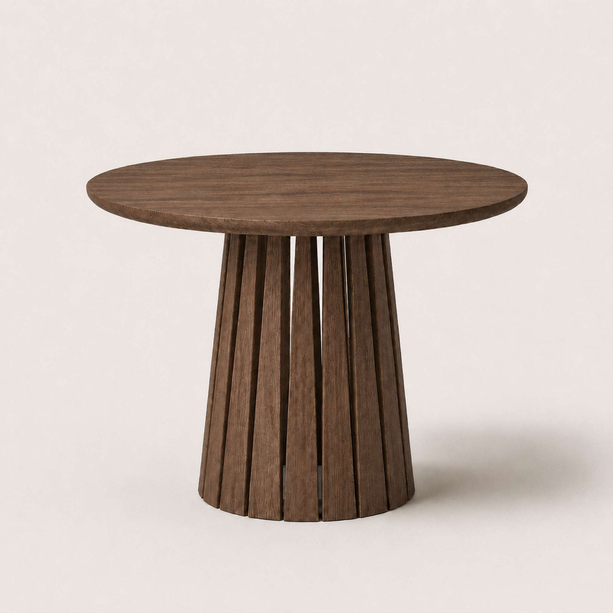 Round Rigi table from ÉTAUDORÉ in solid oak wood with a beautiful base in a graphite finish