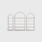 Arched bookcase Arkada, available in Switzerland through ÉTAUDORÉ, made from highest quality powdered coated steel in cold beige