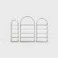 Arched bookcase Arkada, available in Switzerland through ÉTAUDORÉ, made from highest quality powdered coated steel in dark matcha green color