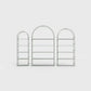 Arched bookcase Arkada, available in Switzerland through ÉTAUDORÉ, made from highest quality powdered coated steel in dark matcha green color