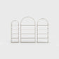 Arched bookcase Arkada, available in Switzerland through ÉTAUDORÉ, made from highest quality powdered coated steel in light beige
