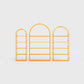 Arched bookcase Arkada, available in Switzerland through ÉTAUDORÉ, made from highest quality powdered coated steel in orange color