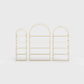 Arched bookcase Arkada, available in Switzerland through ÉTAUDORÉ, made from highest quality powdered coated steel in sand color
