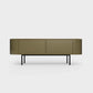 Curved Desiva Enna 01 lowboard in brown olive color steel, available in Switzerland via ÉTAUDORÉ