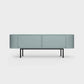 Curved Desiva Enna 01 lowboard in celadon green color steel, available in Switzerland via ÉTAUDORÉ