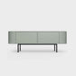 Curved Desiva Enna 01 lowboard in dark matcha green color steel, available in Switzerland via ÉTAUDORÉ