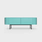 Curved Desiva Enna 01 lowboard in forget me not blue-green color steel, available in Switzerland via ÉTAUDORÉ