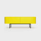 Curved Desiva Enna 01 lowboard in lemon yellow color steel, available in Switzerland via ÉTAUDORÉ