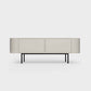Curved Desiva Enna 01 lowboard in light beige steel, available in Switzerland via ÉTAUDORÉ