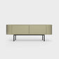 Curved Desiva Enna 01 lowboard in light olive color steel, available in Switzerland via ÉTAUDORÉ