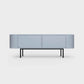 Curved Desiva Enna 01 lowboard in pigeon blue color steel, available in Switzerland via ÉTAUDORÉ