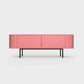 Curved Desiva Enna 01 lowboard in rose pink color steel, available in Switzerland via ÉTAUDORÉ