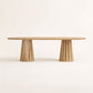 Front view of the ÉTAUDORÉ Noemi Rounded Oval Table in solid oak wood, designed in collaboration with Noemi Gwalter Rubino