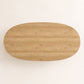 Tabletop view of the ÉTAUDORÉ Noemi Rounded Oval Table in solid oak wood, designed in collaboration with Noemi Gwalter Rubino