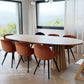 ÉTAUDORÉ Noemi Rounded Oval Table made from solid oak wood in raw finish, in Noemi Rubino's home