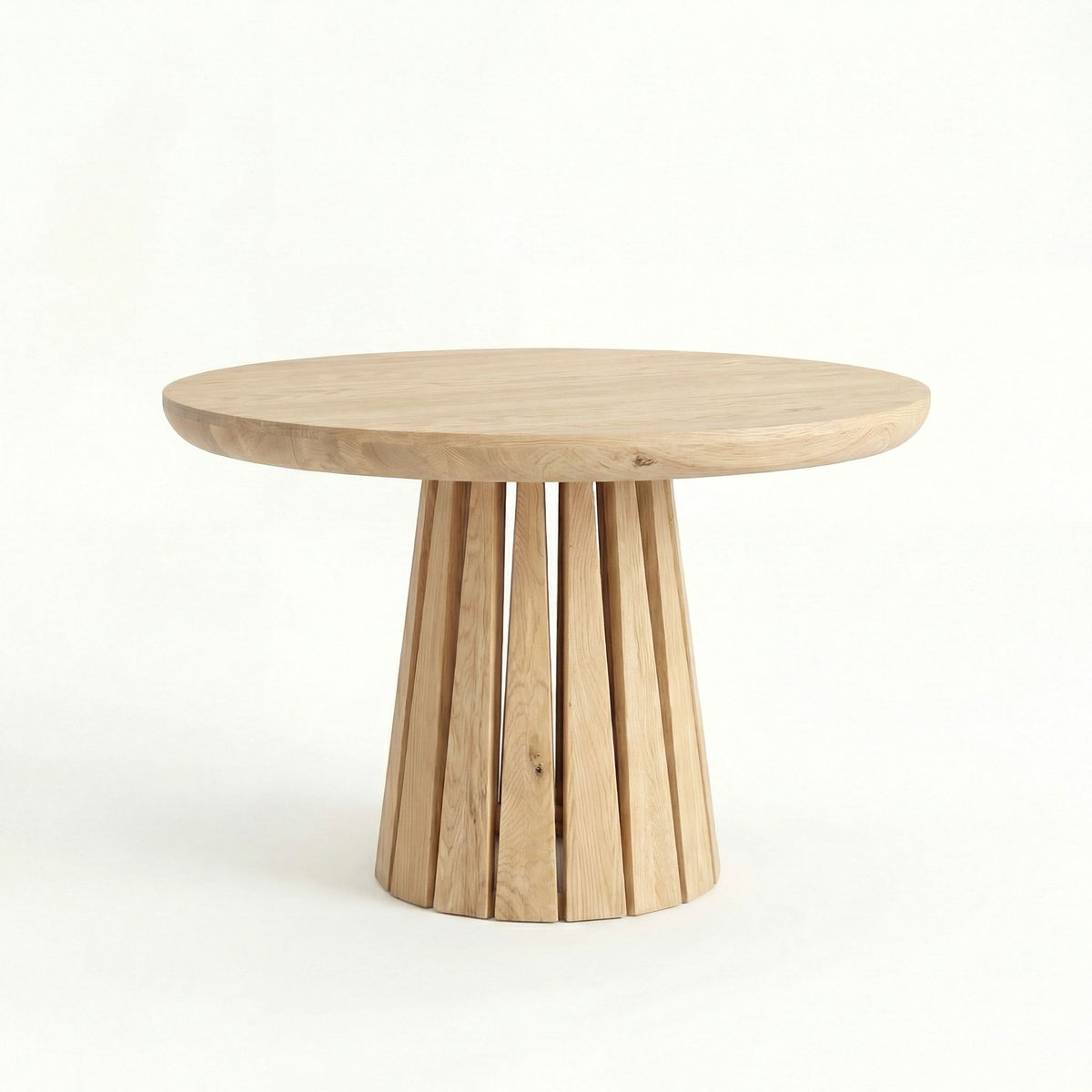 ÉTAUDORÉ Rigi extendable round table in raw finish
