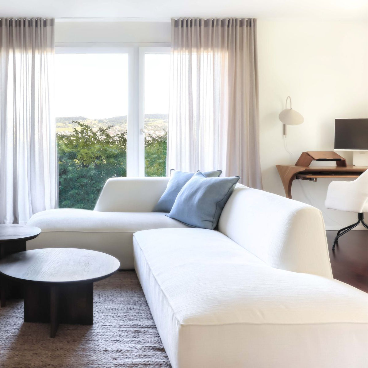 ÉTAUDORÉ Saane sofa in white-cream in the ÉTAUDORÉ showroom