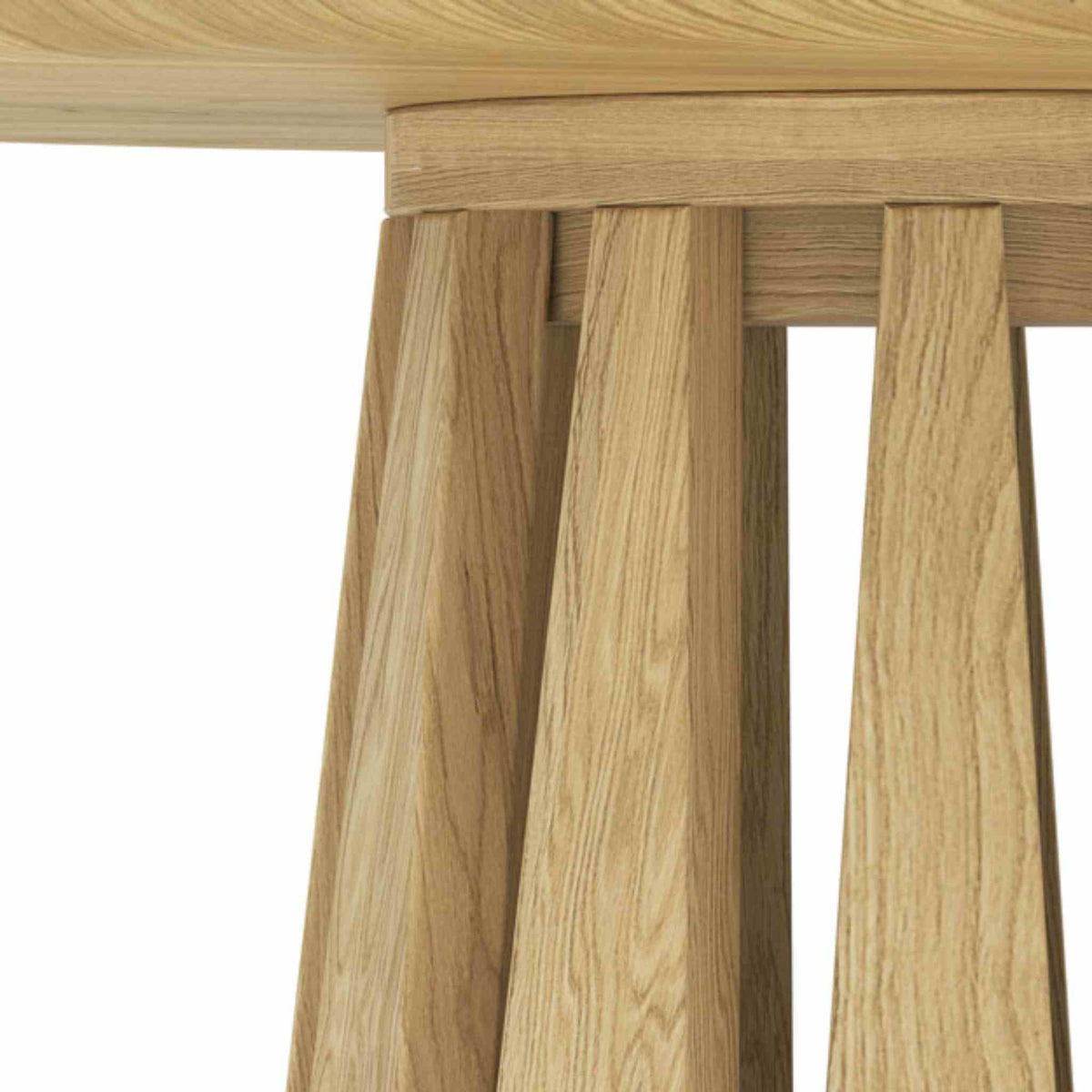 Close up of the Round Rigi Coffee Table in solid oak wood with a beautiful base