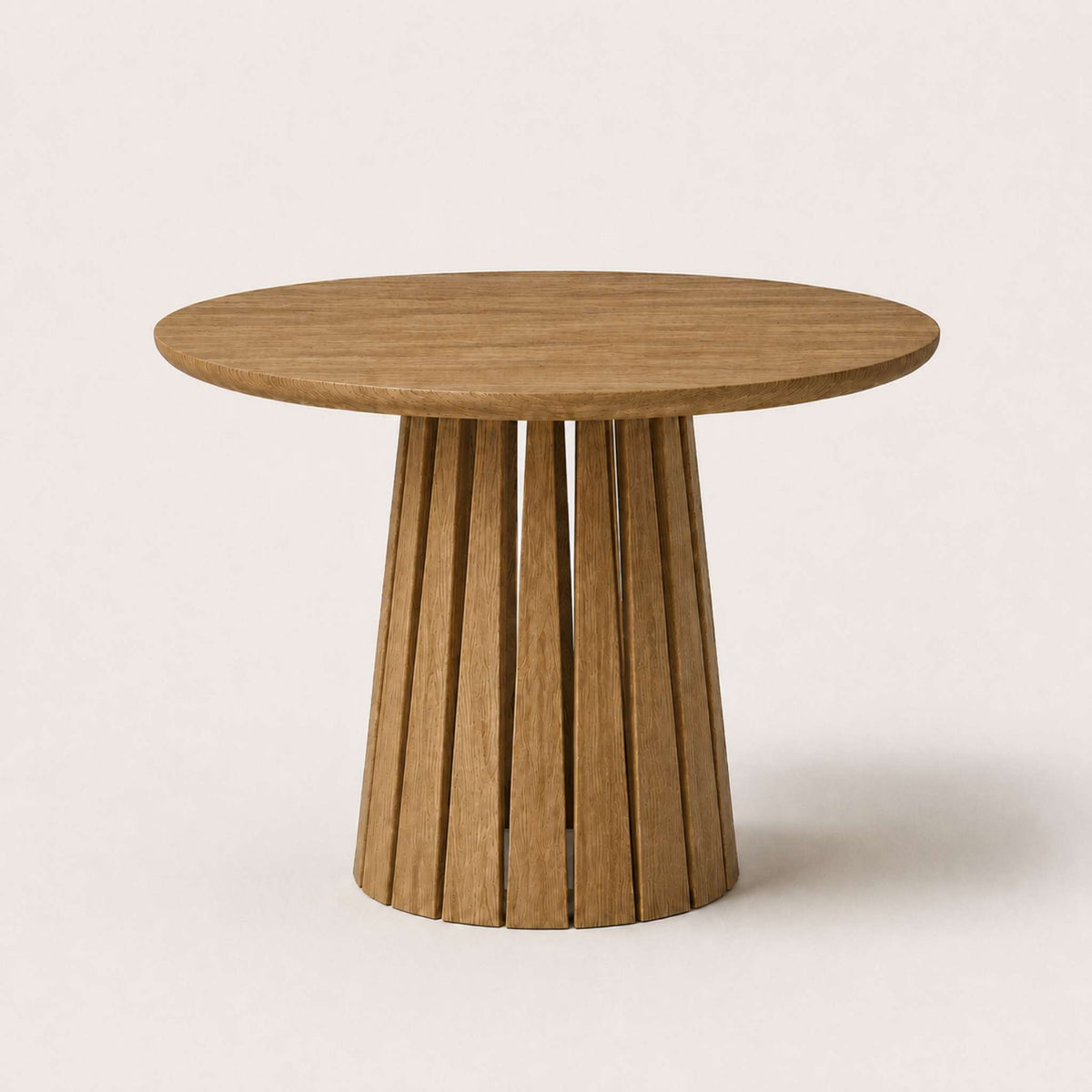 Round Rigi table from ÉTAUDORÉ in solid oak wood with a beautiful base in a dark finish