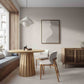 Chair arrangement with the Round Rigi table from ÉTAUDORÉ in solid oak wood with a beautiful base